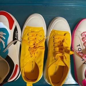 Three pair of sneakers.